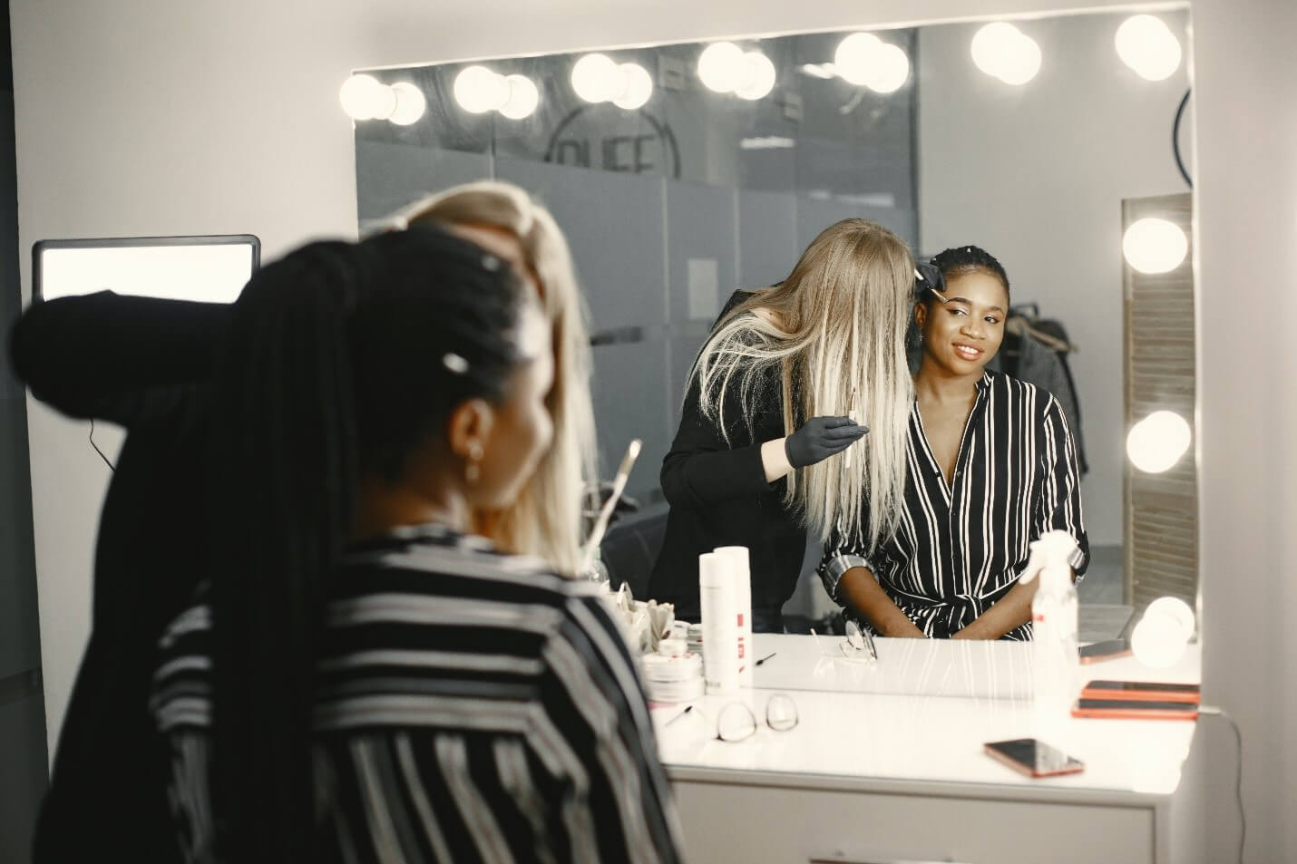 a makeup artist working, an example of one of the career opportunities in the beauty industry