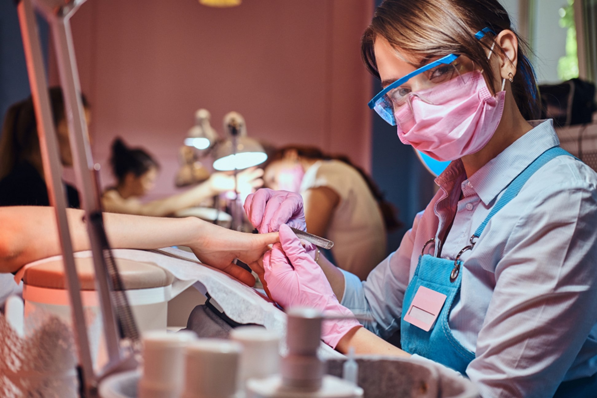 Women having nails filed