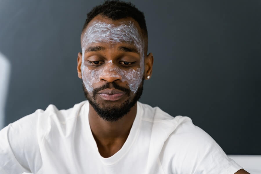 bearded man with skincare mask