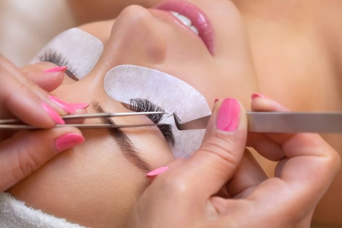 lash extensions being added to women