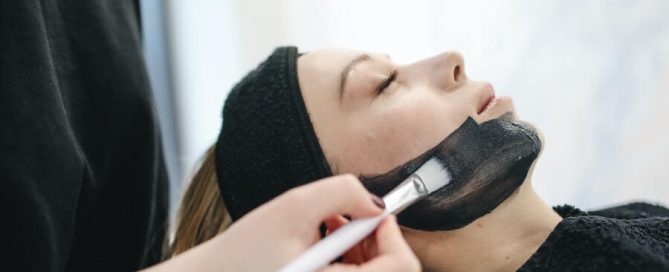 esthetician applying facial treatment