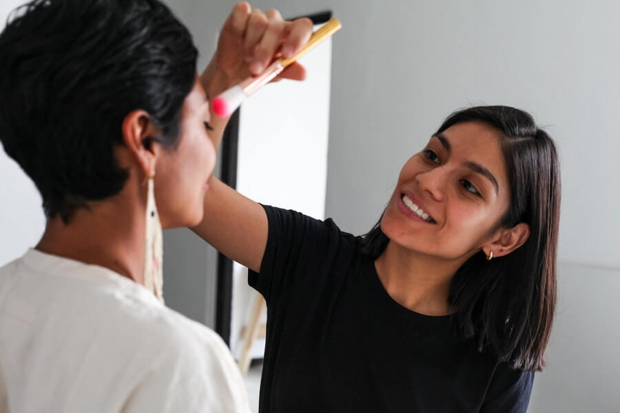 smiling makeup artist